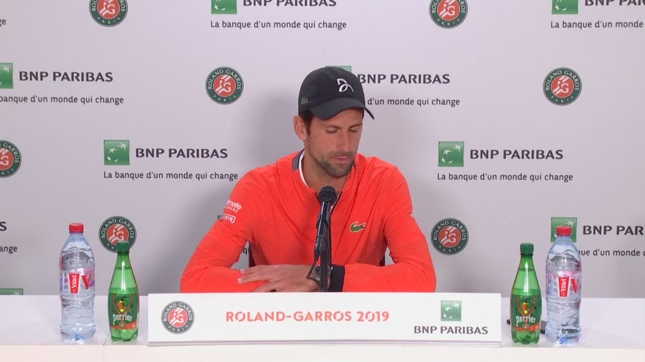 Djokovic talks after winning his opening game in the French Open
