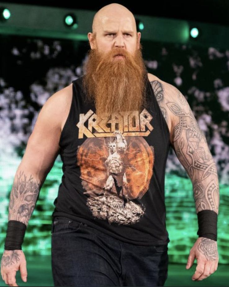 WWE: 5 Metal Band T-Shirts We'd Like To See WWE SDLive Tag Team Champion Rowan Wear