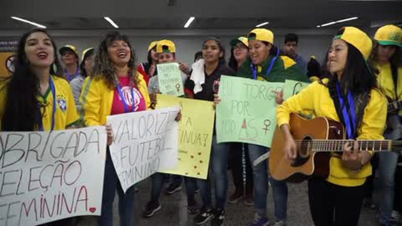 Brazil fans arrive in force as they congratulate their 'warriors' home from France