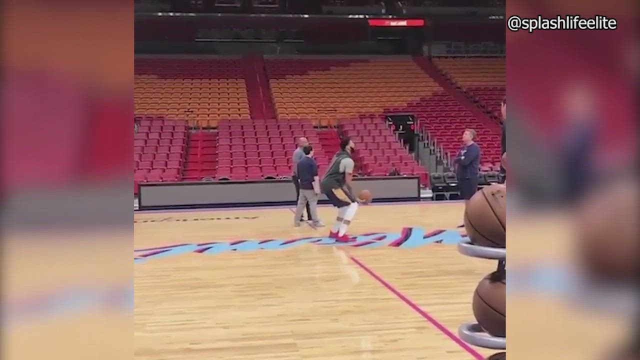 Anthony David scores from centre court without looking